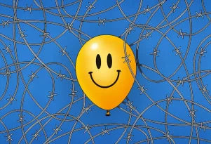 clip art of a smiley-faced balloon surrounded by barbed wire