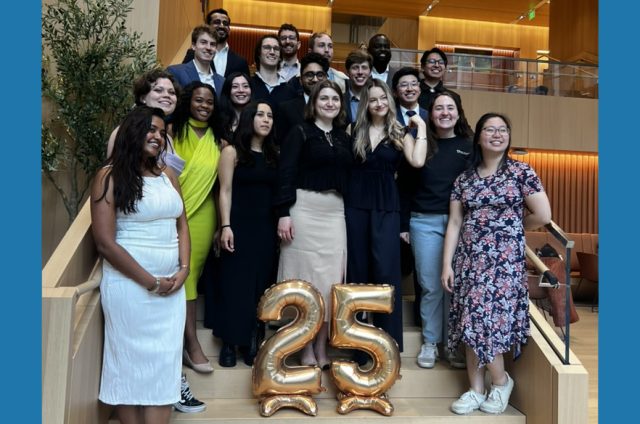 the graduates of TPP 2025 posing on a staircase in front of 25